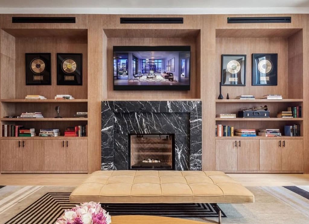 brown tv cabinet near wooden tea table