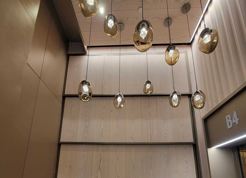 lightings with custom woodwork on walls